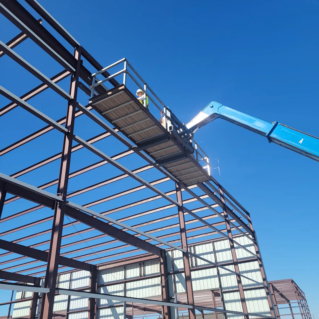 Commercial steel erection from a boom lift