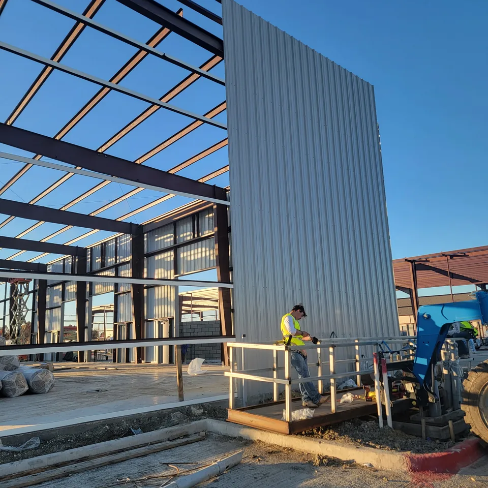 Commercial steel framing and metal wall panels